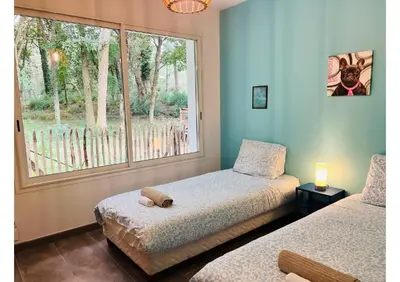 Un ou plusieurs lits dans un hébergement de l'établissement Villa d'exception à Capbreton proche des plages