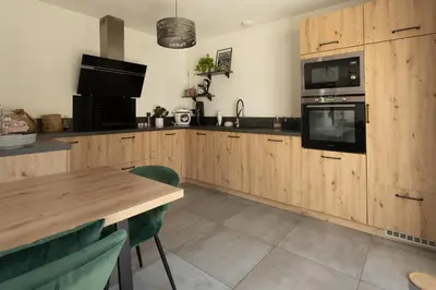 Cuisine ou kitchenette dans l'établissement Maison Landes