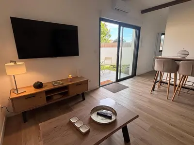 Télévision ou salle de divertissement dans l'établissement DACSE-VILLAGE - Gite 03