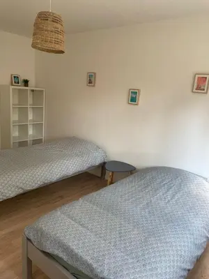 Un ou plusieurs lits dans un hébergement de l'établissement New house for 8 people