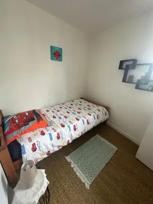 Un ou plusieurs lits dans un hébergement de l'établissement Maison familiale avec piscine
