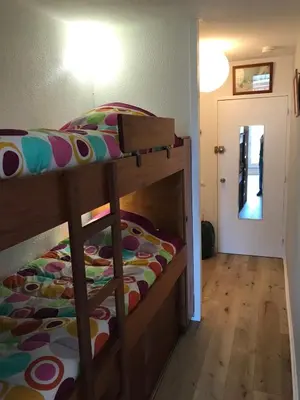 Un ou plusieurs lits dans un hébergement de l'établissement Grand studio calme vue sur port