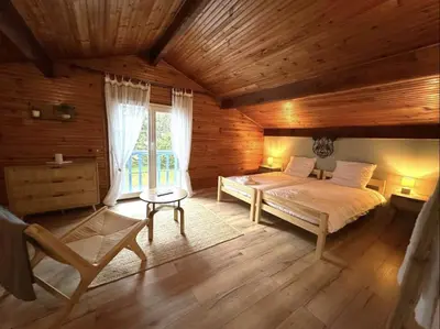 Un ou plusieurs lits dans un hébergement de l'établissement Maison Landena