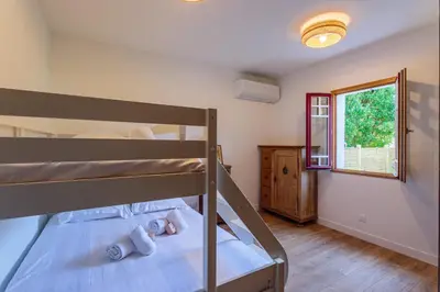 Un ou plusieurs lits dans un hébergement de l'établissement Appartement Gracieuse - Welkeys