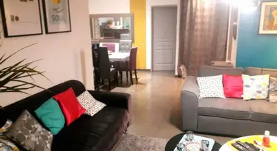 Coin salon dans l'établissement Maison Entre lac et océan