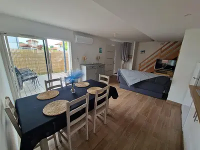 Coin salon dans l'établissement Plein centre Mimizan Bourg