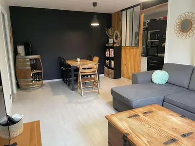 Coin salon dans l'établissement Logement proximité des plages