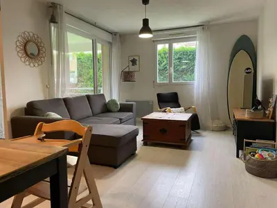 Coin salon dans l'établissement Logement proximité des plages