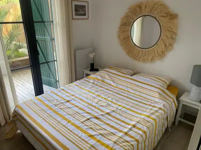 Un ou plusieurs lits dans un hébergement de l'établissement Maison proche plage et Golf