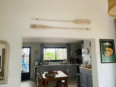 Cuisine ou kitchenette dans l'établissement Maison proche plage et Golf