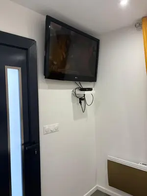 Télévision ou salle de divertissement dans l'établissement Studio moderne