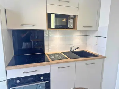 Cuisine ou kitchenette dans l'établissement Vintage - Calme - Elégant - Terrasse
