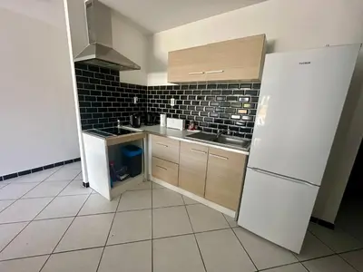 Cuisine ou kitchenette dans l'établissement Residence du littoral