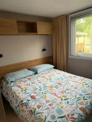 Un ou plusieurs lits dans un hébergement de l'établissement Mobil home B1Bis La Pointe LB