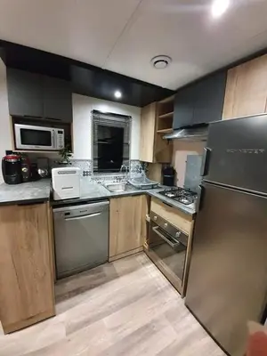Cuisine ou kitchenette dans l'établissement La Réserve 4 étoiles à Gastes emplacement 594 3CH 1SDB 8 personnes