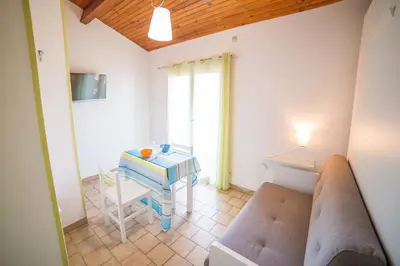 Coin salon dans l'établissement Appartements Les Déferlantes Mimizan-plage