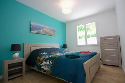 Un ou plusieurs lits dans un hébergement de l'établissement Villa Coquillage