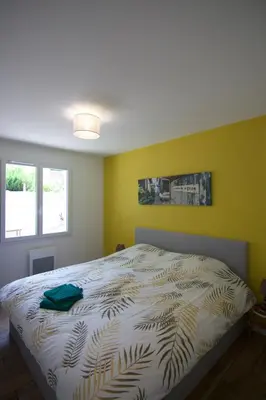 Un ou plusieurs lits dans un hébergement de l'établissement Villa Coquillage