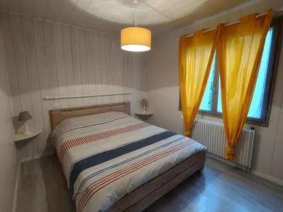 Un ou plusieurs lits dans un hébergement de l'établissement Comfortable house with garden