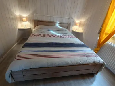 Un ou plusieurs lits dans un hébergement de l'établissement Comfortable house with garden