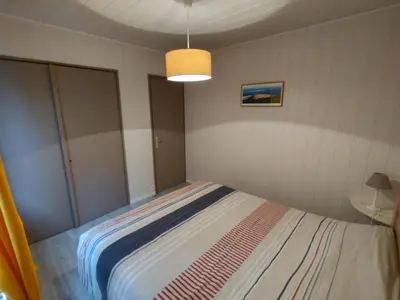 Un ou plusieurs lits dans un hébergement de l'établissement Comfortable house with garden