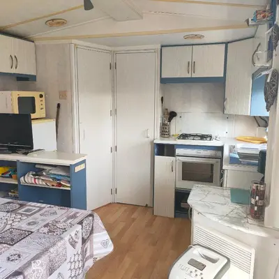 Cuisine ou kitchenette dans l'établissement Mobil-home Camping MIMIZAN