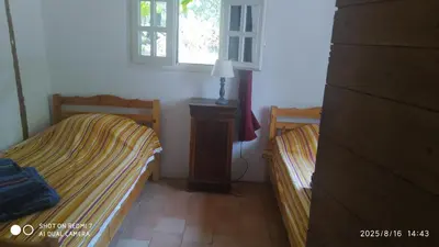 Un ou plusieurs lits dans un hébergement de l'établissement Maison Landaise En Pleine Nature