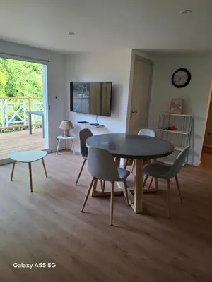 Télévision ou salle de divertissement dans l'établissement Le Nid paisible