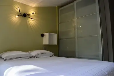 Un ou plusieurs lits dans un hébergement de l'établissement Villa Hossegor 8 personnes proche du Lac