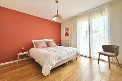 Un ou plusieurs lits dans un hébergement de l'établissement Villa luxueuse avec piscine