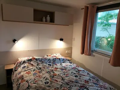 Un ou plusieurs lits dans un hébergement de l'établissement Mobil-home haut standing - Séjour idéal entre Lac & Océan !
