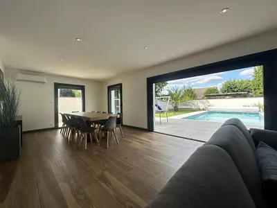 Coin salon dans l'établissement La Villa Estienne - Spacieuse - Conviviale - 6 Chambres - Parking privé