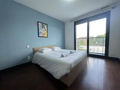 Un ou plusieurs lits dans un hébergement de l'établissement La Villa Estienne - Spacieuse - Conviviale - 6 Chambres - Parking privé