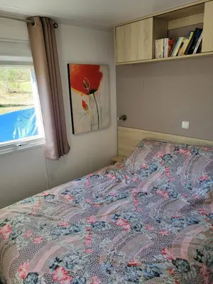 Un ou plusieurs lits dans un hébergement de l'établissement MH203 3chambres dont suite parentale et 2 salles de bain dans camping 4 étoiles