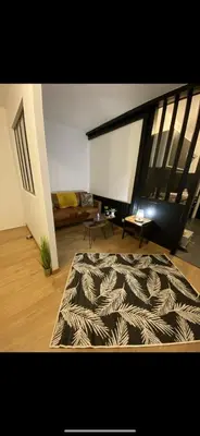 Coin salon dans l'établissement Le cosy de Tom