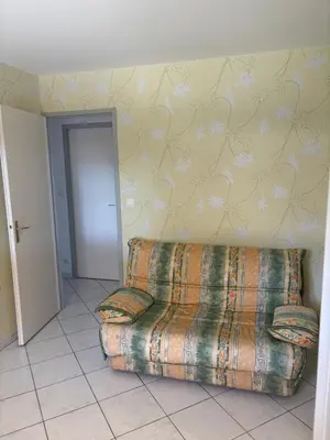 Coin salon dans l'établissement Maison au calme
