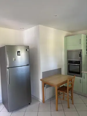 Cuisine ou kitchenette dans l'établissement Maison au calme