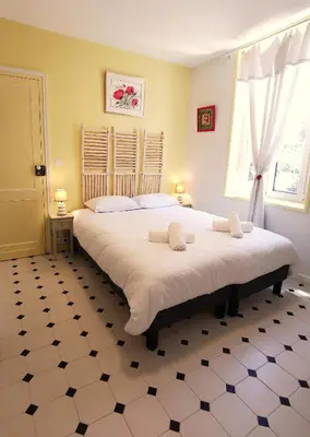 Un ou plusieurs lits dans un hébergement de l'établissement La grange des Bruyères, maison rénovée, 5 chambres