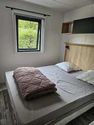 Un ou plusieurs lits dans un hébergement de l'établissement Mobilhomme Privilège
