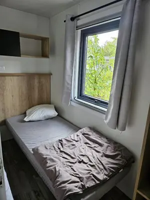 Un ou plusieurs lits dans un hébergement de l'établissement Mobilhomme Privilège