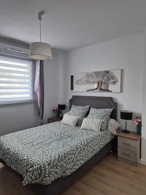 Un ou plusieurs lits dans un hébergement de l'établissement Villa 6 personnes entre nature et océan