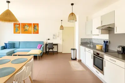 Cuisine ou kitchenette dans l'établissement Appartement cosy avec grand jardin privatif