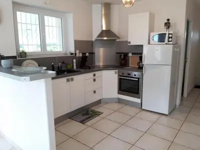 Cuisine ou kitchenette dans l'établissement Gite de la teoulere