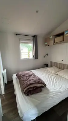 Un ou plusieurs lits dans un hébergement de l'établissement 404 mobil-home 3 chambres 2 sdb bassin d'Arcachon