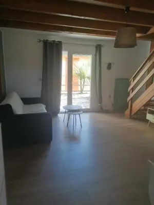 Coin salon dans l'établissement Le petit paradis