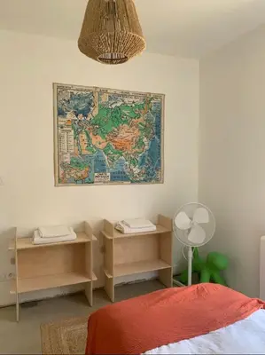 Un ou plusieurs lits dans un hébergement de l'établissement Maison avec 2 chambres à Hossegor