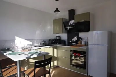 Cuisine ou kitchenette dans l'établissement Le Jardin de Sauge