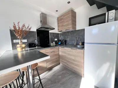 Cuisine ou kitchenette dans l'établissement Studio confortable centre-ville Mont de Marsan