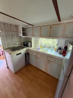 Cuisine ou kitchenette dans l'établissement Mobil-home