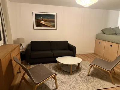Coin salon dans l'établissement Cozy apartment with outdoor terrace